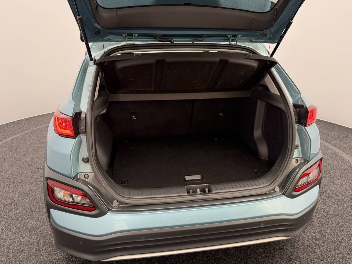 Hyundai Kona Hyundai Kona EV Limited 64 kWh 3- Fase SOH 95,6% | Warmtepomp | Elektrisch Schuif/Kanteldak | Camera | Leer | Head-Up Display
