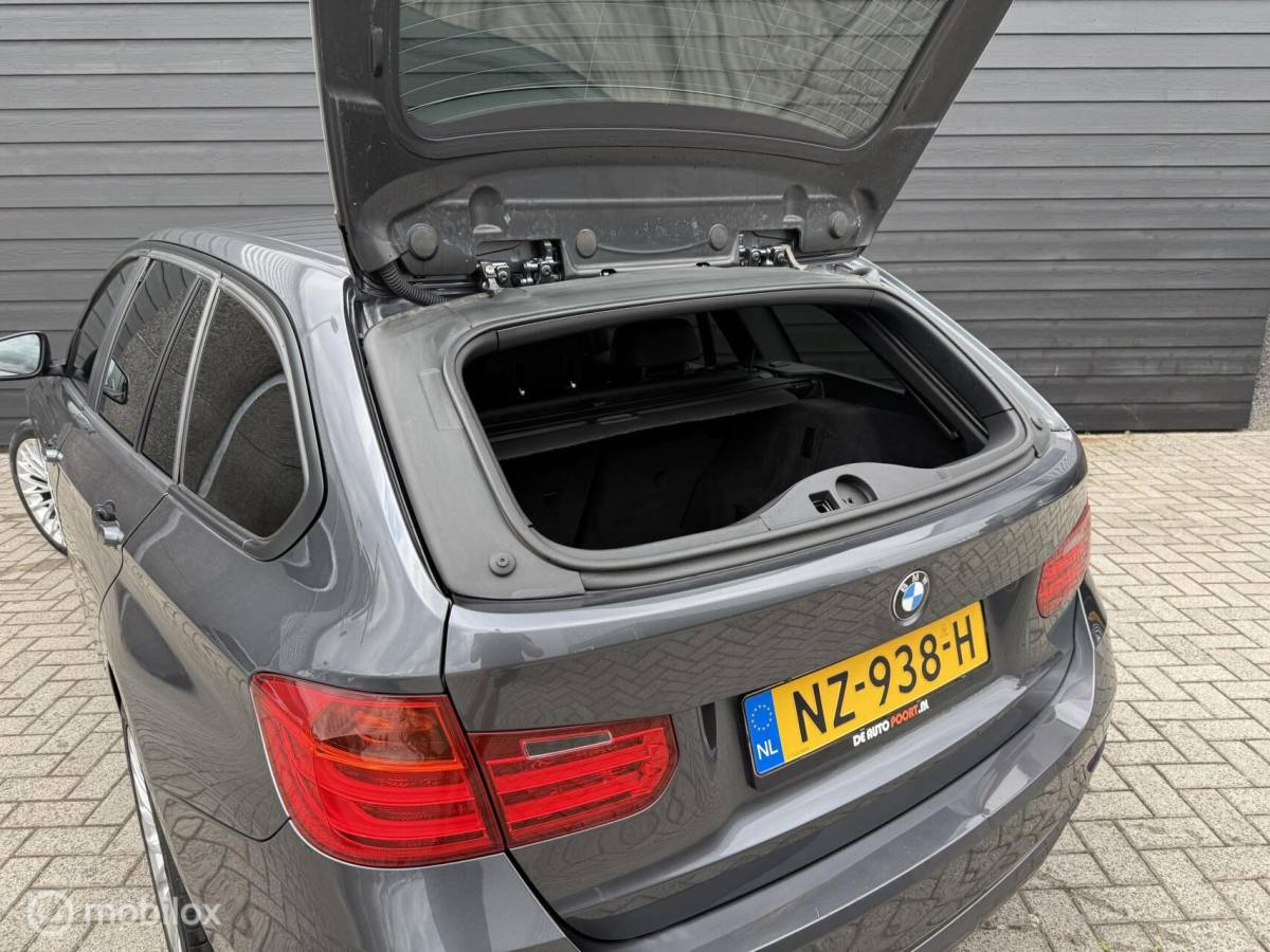 BMW 3 Serie BMW 3-serie Touring 318d High Executive Leder/Navi/Cruise
