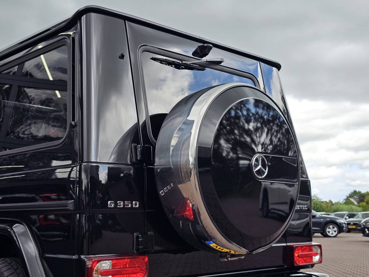 Mercedes-Benz G-Klasse Mercedes-Benz G-klasse 350 BLUETEC 211PK | Distronic | Schuif/kantel dak | Designo | Stoelverwarming/verkoeling | Stuurverw. | Trekhaak | Elek. stoelen + memory | Camera | Standverwarming | Grijs kenteken | Vol |