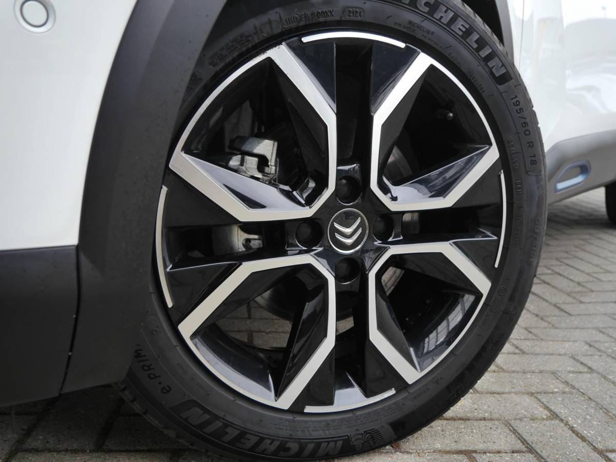 Citroën ë-C4 Citroen Ë-C4 Shine 50 kWh | Keyless entry en start | SOH 89.9% | 18 inch lichtmetalen velgen | Achteruitrijcamera | Adaptive cruise control | Head up display | Climate control | Extra getint glas