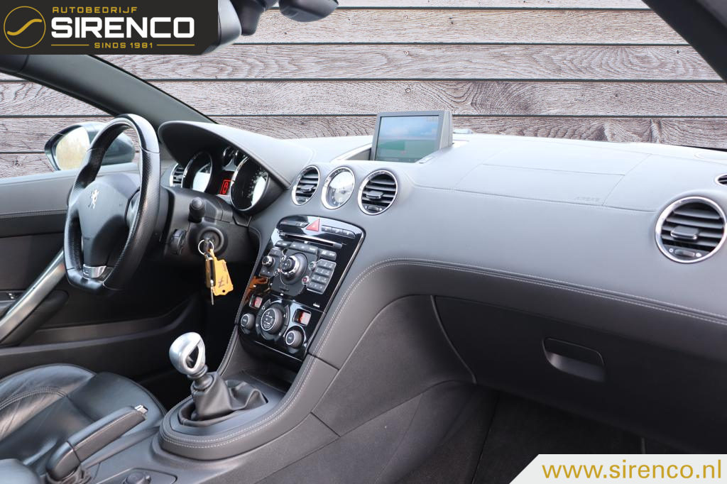 Peugeot RCZ Peugeot RCZ 1.6 200 pk Asphalt | lederen dash + stoelen met memory en stoelverwarming | bluetooth | climate & cruise control | navigatie