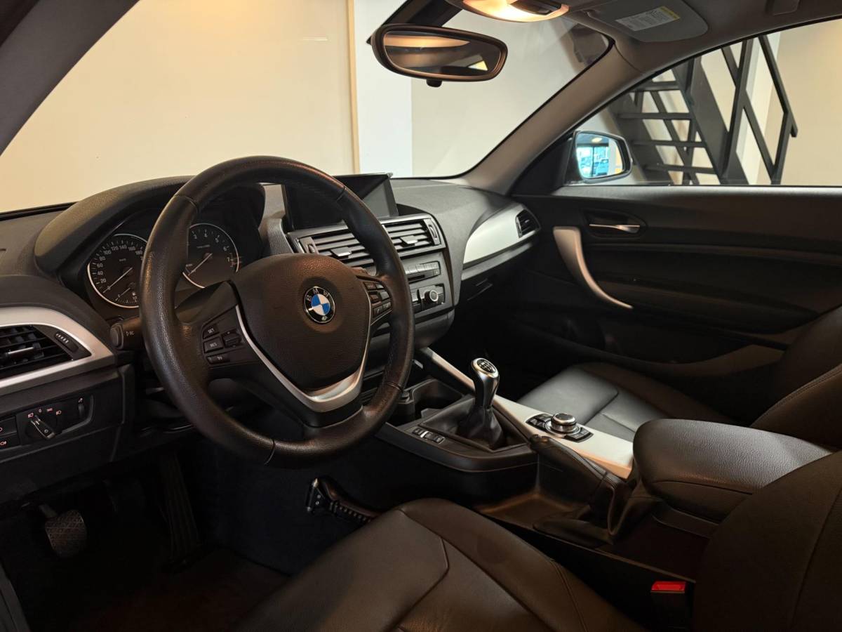 BMW 1 Serie BMW 1-serie 114i EDE Upgrade Edition *Carplay* All-seasons|Leer|Cruise