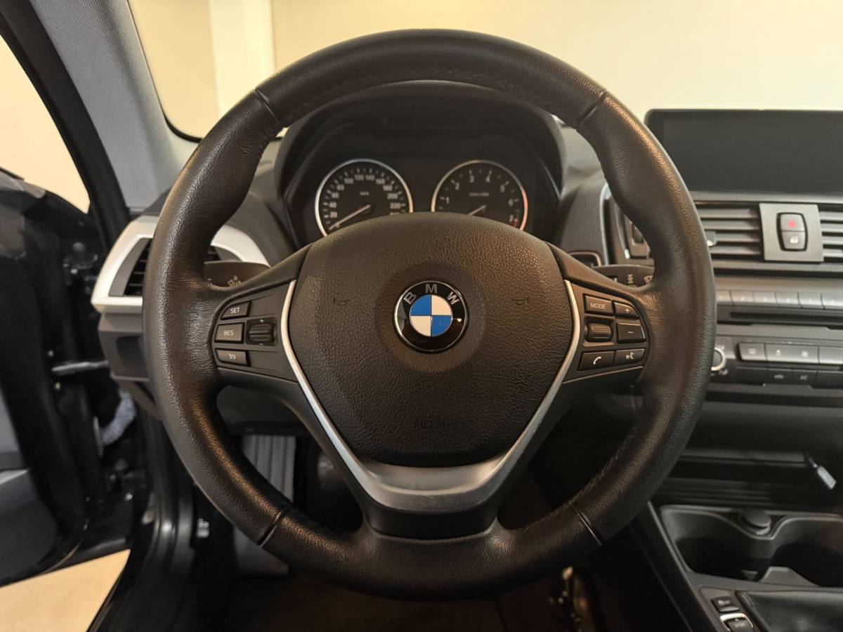 BMW 1 Serie BMW 1-serie 114i EDE Upgrade Edition *Carplay* All-seasons|Leer|Cruise