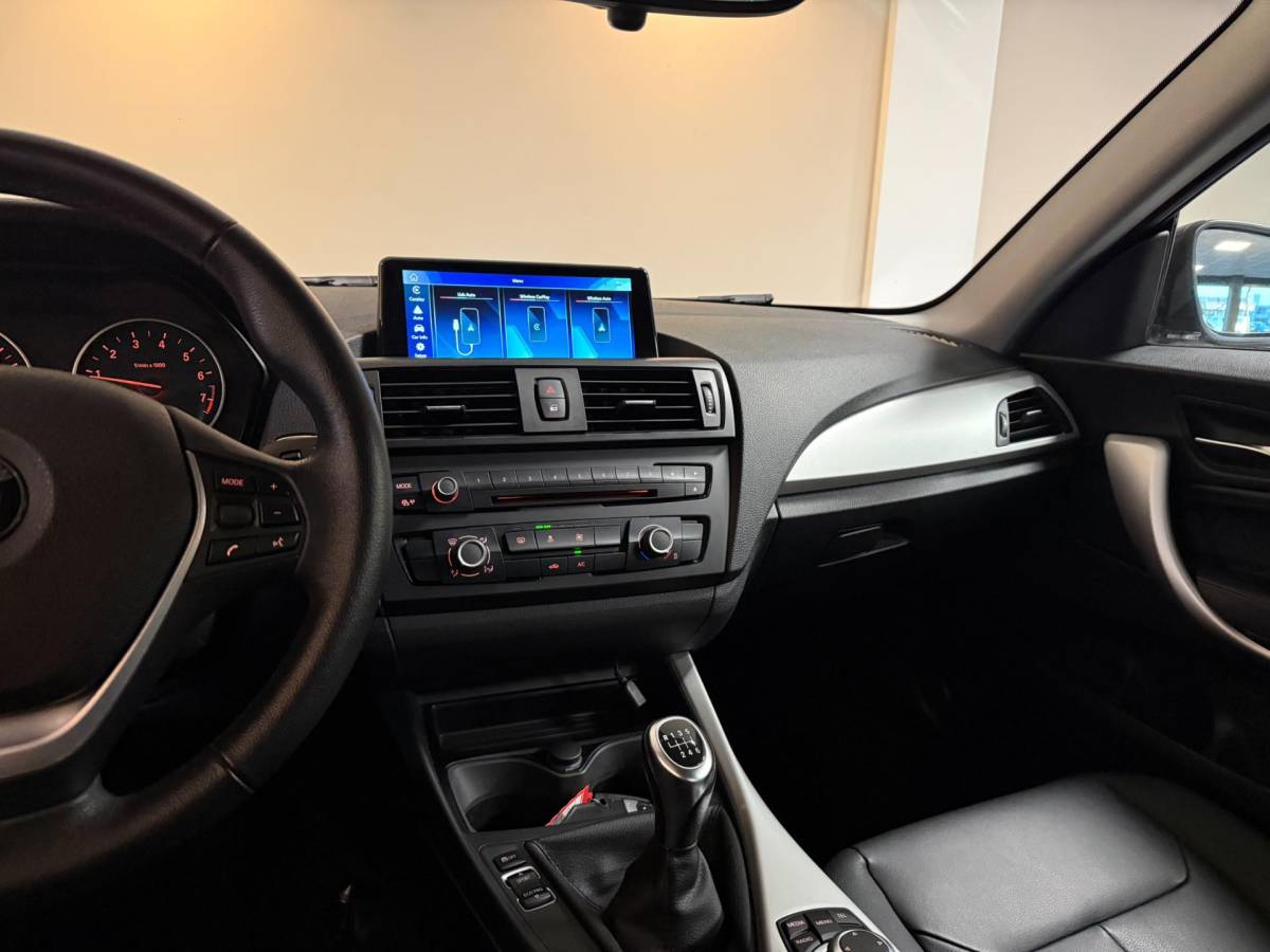 BMW 1 Serie BMW 1-serie 114i EDE Upgrade Edition *Carplay* All-seasons|Leer|Cruise