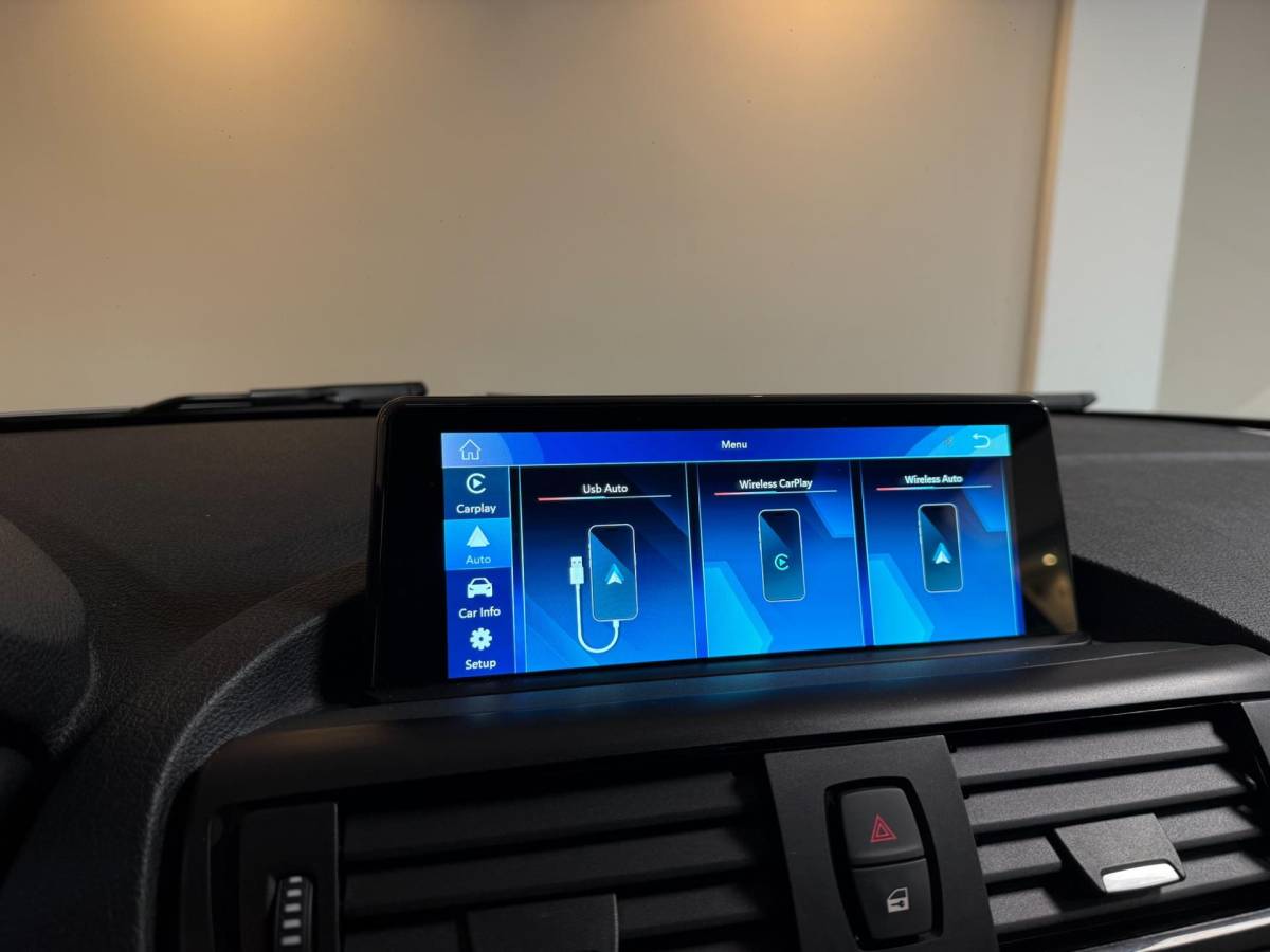 BMW 1 Serie BMW 1-serie 114i EDE Upgrade Edition *Carplay* All-seasons|Leer|Cruise