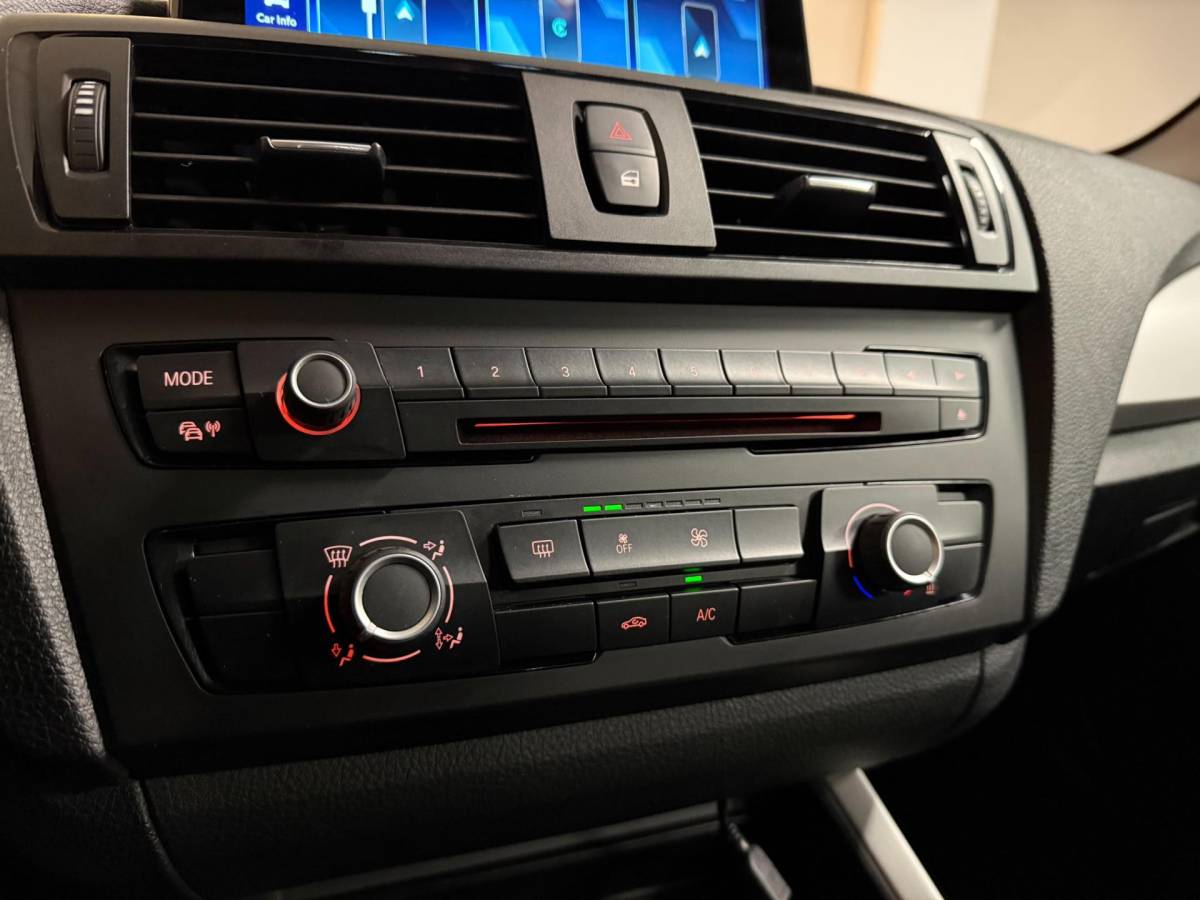 BMW 1 Serie BMW 1-serie 114i EDE Upgrade Edition *Carplay* All-seasons|Leer|Cruise