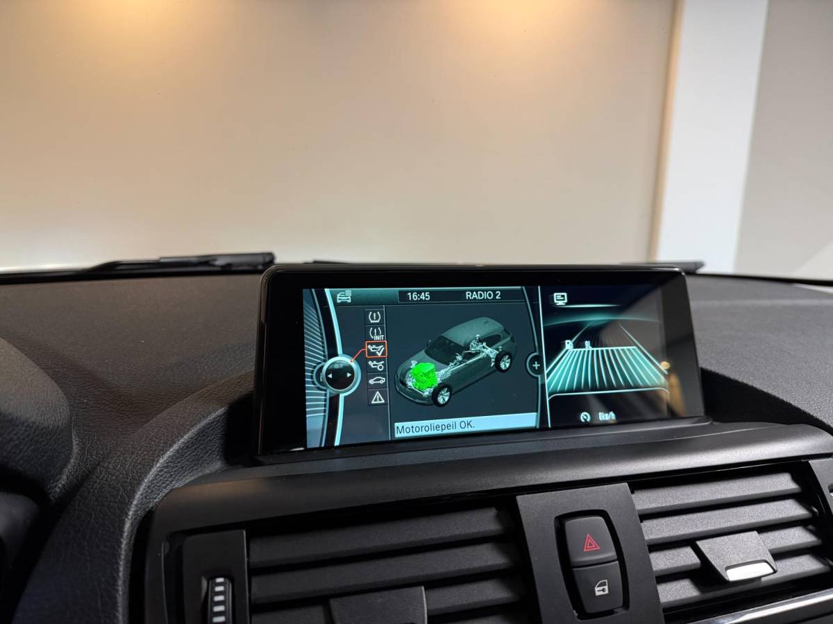 BMW 1 Serie BMW 1-serie 114i EDE Upgrade Edition *Carplay* All-seasons|Leer|Cruise