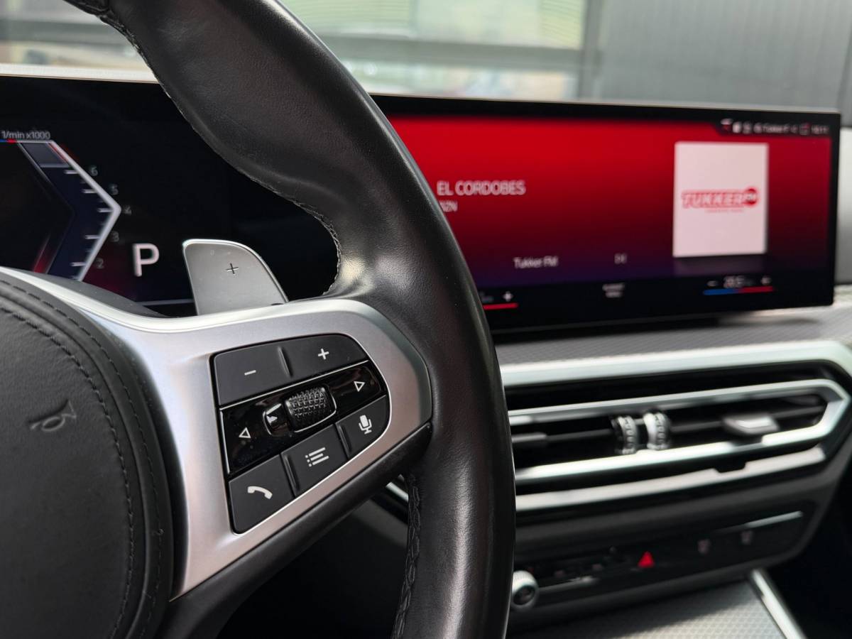 BMW 3 Serie BMW 3-Serie 320i M-Sport Shadowline Harman Kardon LCI