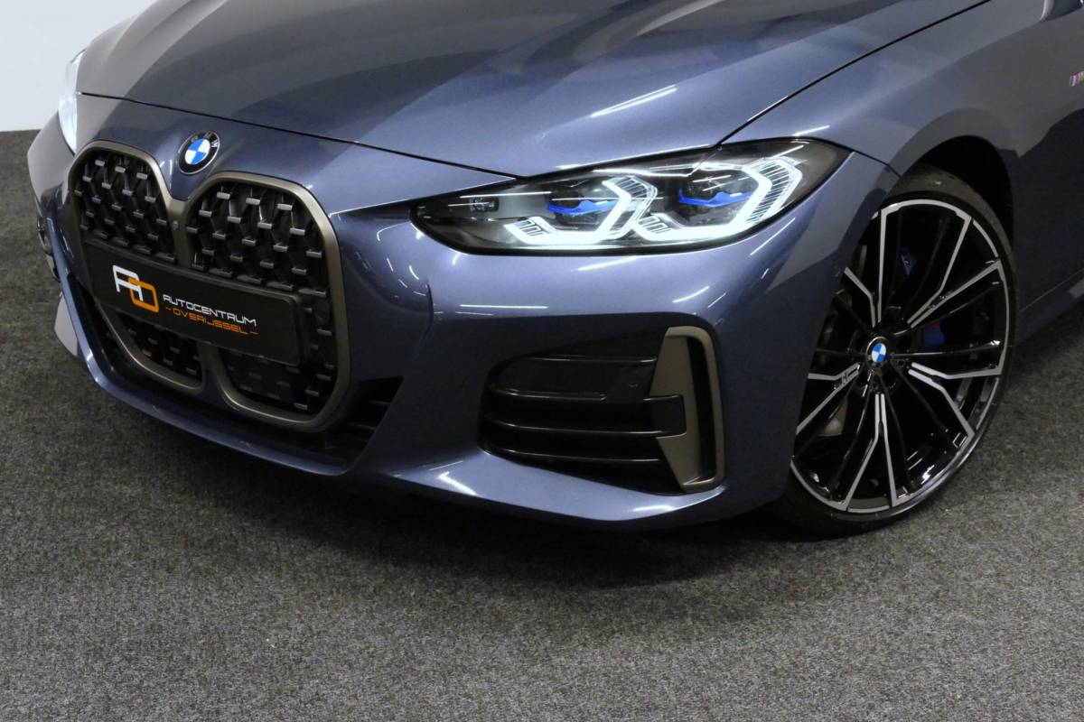 BMW 4 Serie BMW 4-serie Cabrio M440i xDrive High Executive / Air Collar (nekverwarming / BMW Laserlight / Elektr. verstelbare voorstoelen (links met memory) / Harman Kardon Surround Sound / Stoelverwarming / 20″ / Rondomzichtcamera / HUD / Apple Carplay – Android Auto / Adaptief M onderstel / Elektr. wegklapbare trekhaak / Leder interieur / Dodehoekdetectie / Achteruitrijcamera
