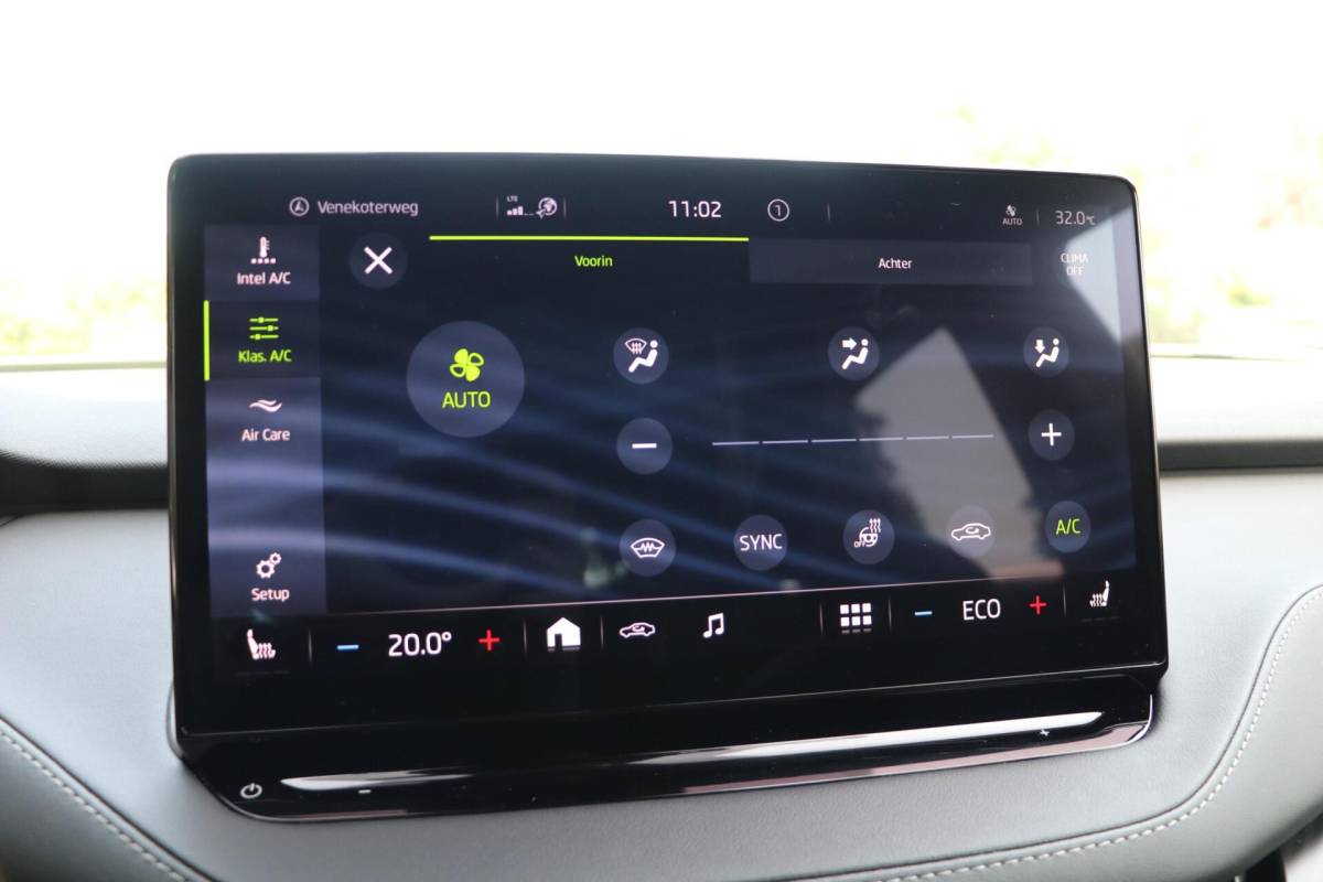 Škoda Enyaq iV Skoda Enyaq iV 60 180PK |SPORTLINE| AdaptiveCruise AppleCarplay Sportzetels Stoel/stuur verwarming Camera 111000KM BJ2021