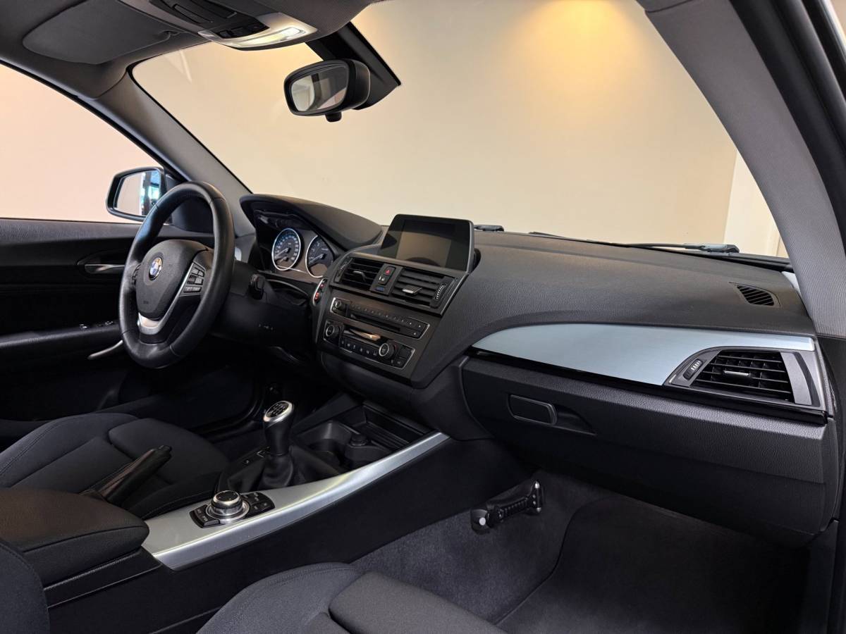 BMW 1 Serie BMW 1-serie 114i EDE Corporate Lease Edition *2de Eigenaar/Dealer OH* Camera|Cruise|Navi|PDC|NAP