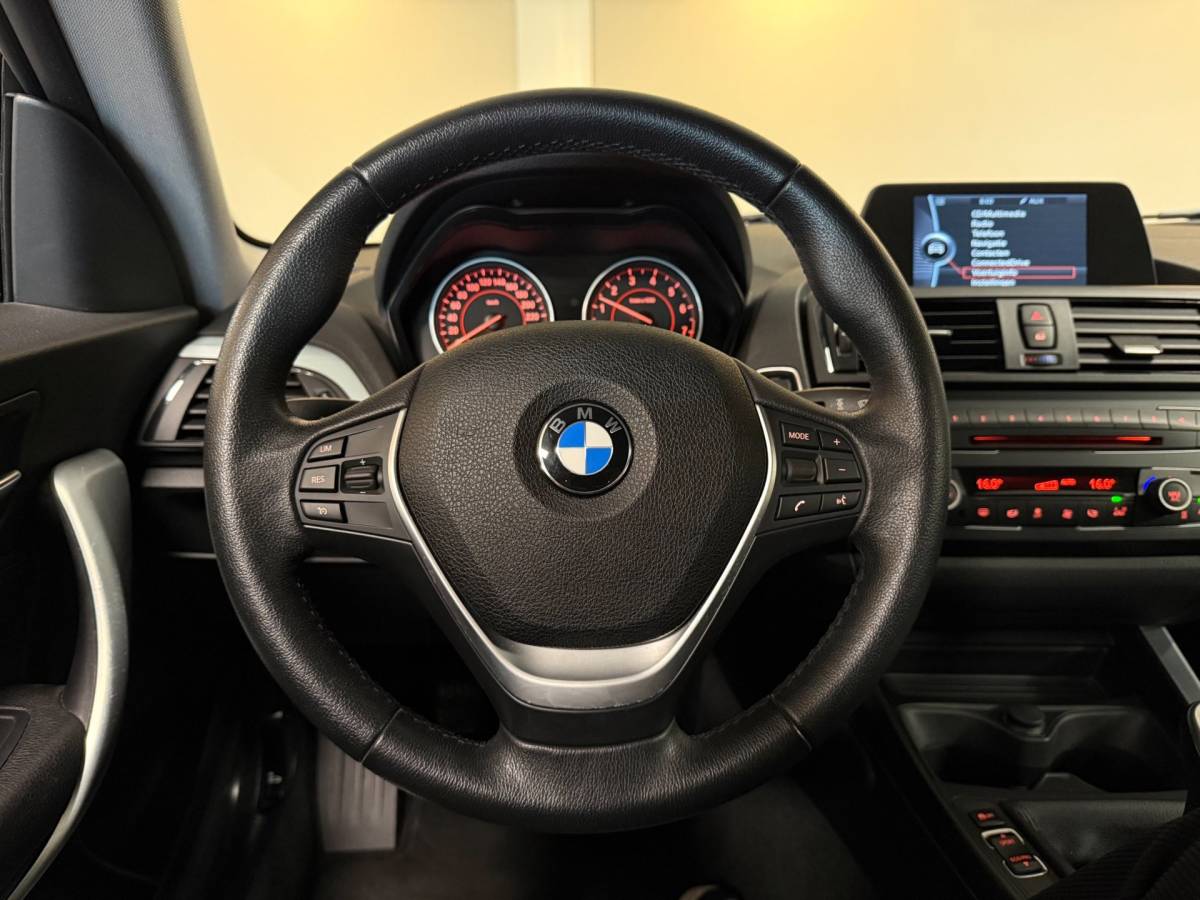 BMW 1 Serie BMW 1-serie 114i EDE Corporate Lease Edition *2de Eigenaar/Dealer OH* Camera|Cruise|Navi|PDC|NAP