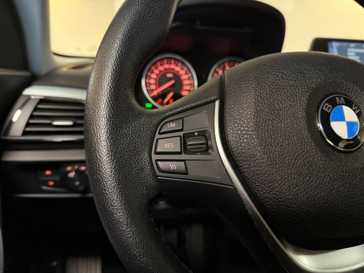 BMW 1 Serie BMW 1-serie 114i EDE Corporate Lease Edition *2de Eigenaar/Dealer OH* Camera|Cruise|Navi|PDC|NAP