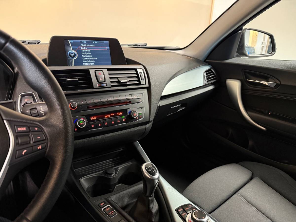 BMW 1 Serie BMW 1-serie 114i EDE Corporate Lease Edition *2de Eigenaar/Dealer OH* Camera|Cruise|Navi|PDC|NAP