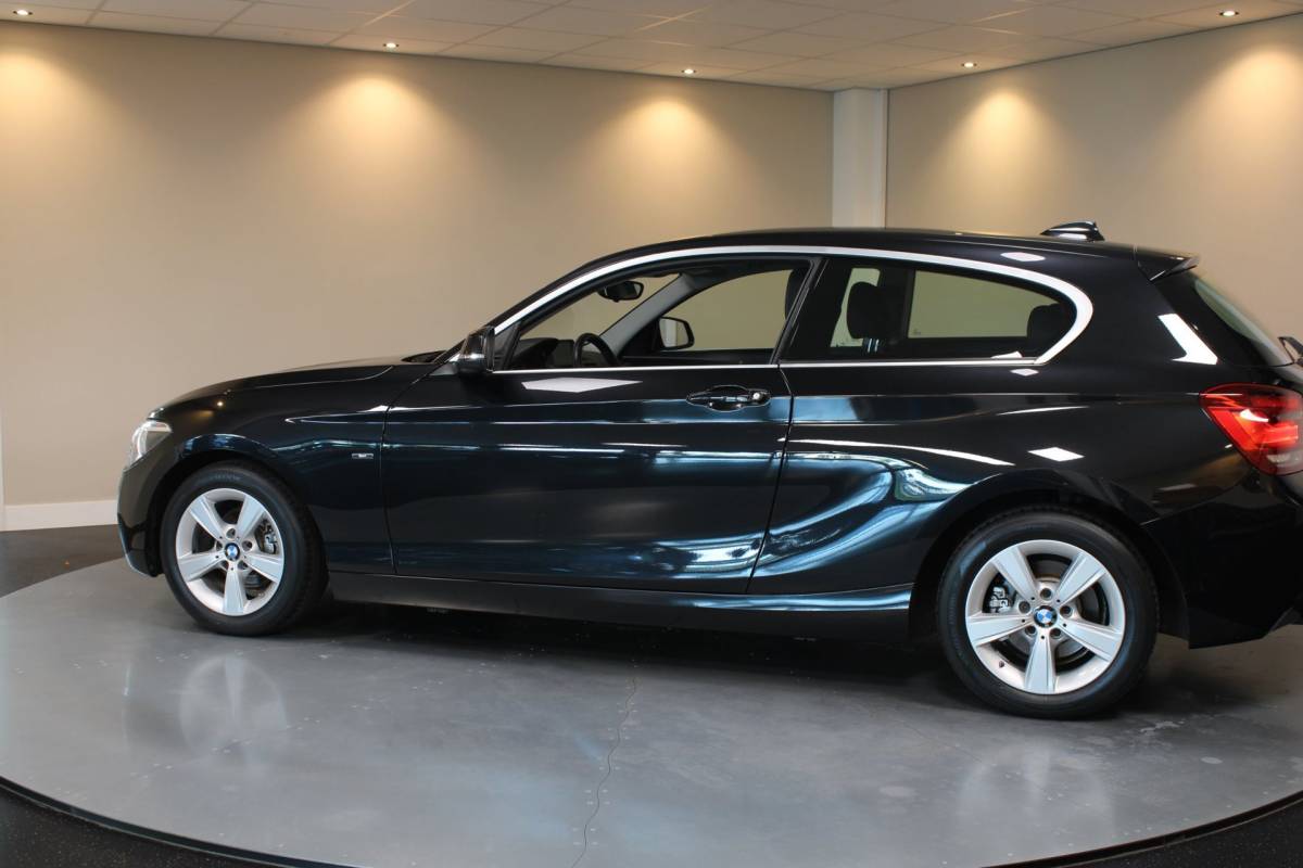 BMW 1 Serie BMW 1-serie 114i EDE Corporate Lease Edition *2de Eigenaar/Dealer OH* Camera|Cruise|Navi|PDC|NAP