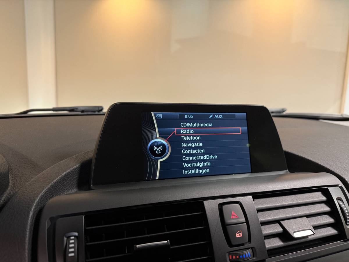 BMW 1 Serie BMW 1-serie 114i EDE Corporate Lease Edition *2de Eigenaar/Dealer OH* Camera|Cruise|Navi|PDC|NAP