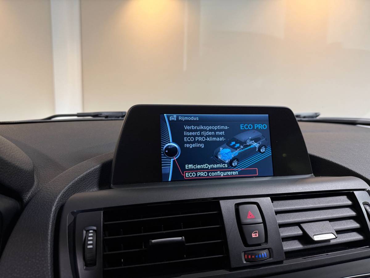 BMW 1 Serie BMW 1-serie 114i EDE Corporate Lease Edition *2de Eigenaar/Dealer OH* Camera|Cruise|Navi|PDC|NAP