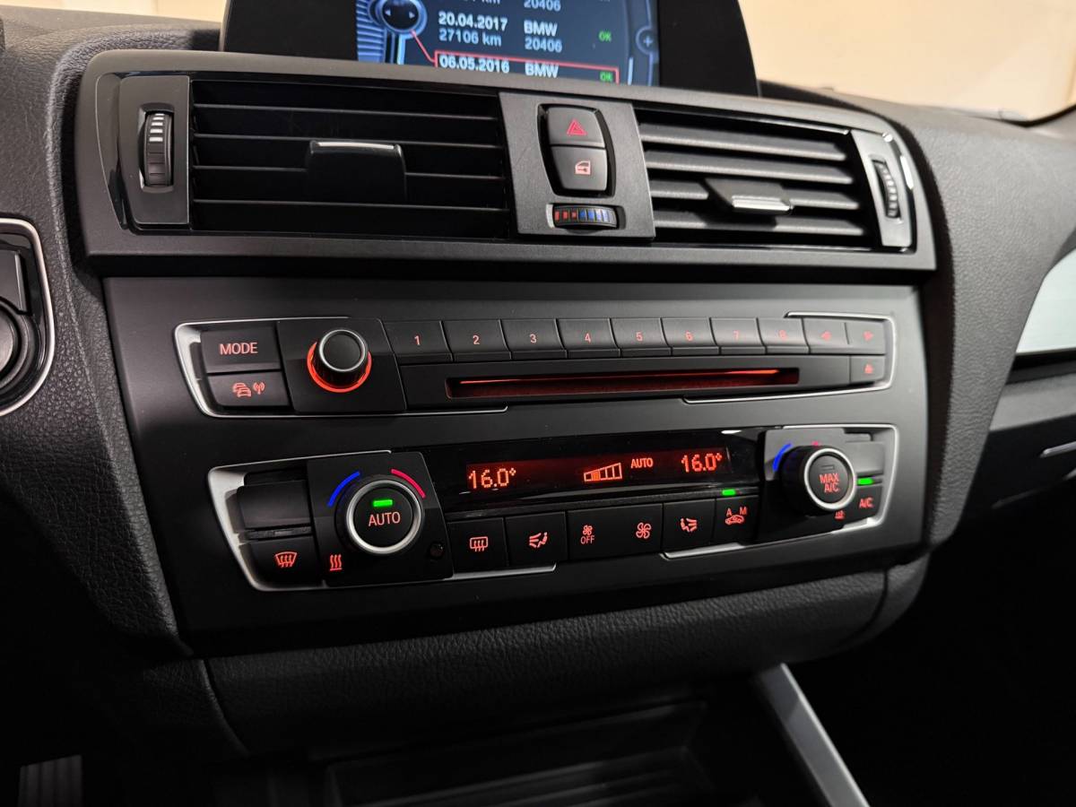 BMW 1 Serie BMW 1-serie 114i EDE Corporate Lease Edition *2de Eigenaar/Dealer OH* Camera|Cruise|Navi|PDC|NAP