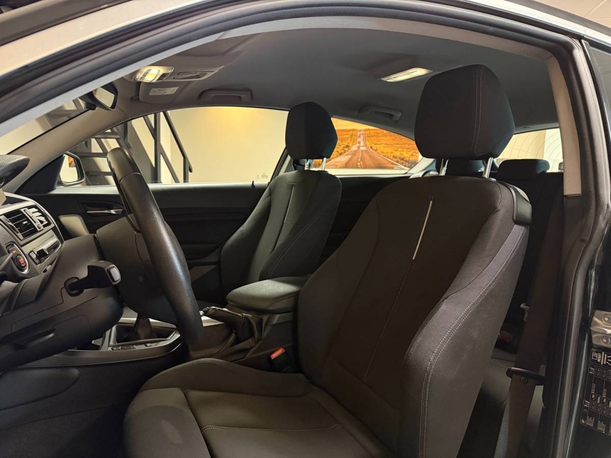 BMW 1 Serie BMW 1-serie 114i EDE Corporate Lease Edition *2de Eigenaar/Dealer OH* Camera|Cruise|Navi|PDC|NAP