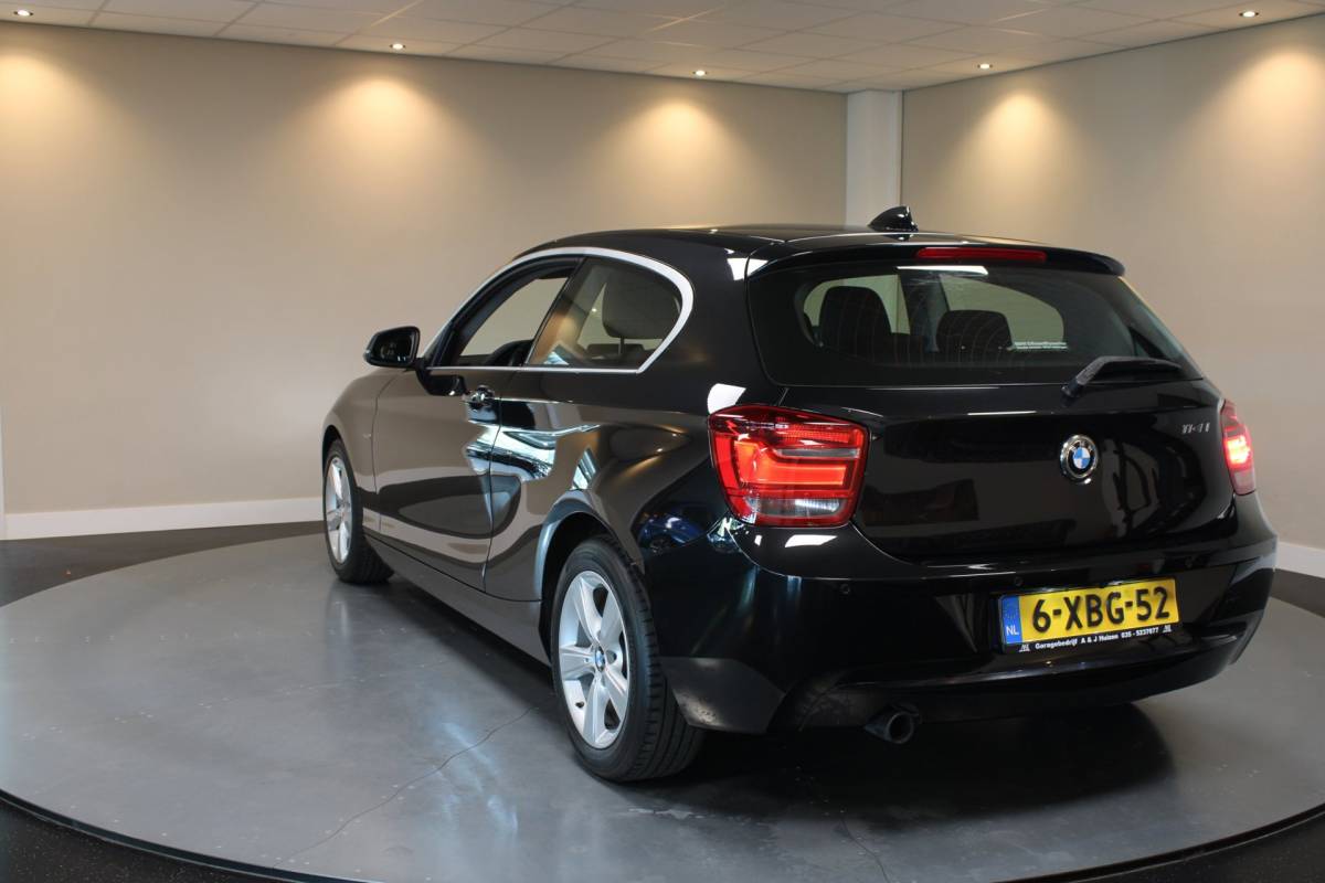 BMW 1 Serie BMW 1-serie 114i EDE Corporate Lease Edition *2de Eigenaar/Dealer OH* Camera|Cruise|Navi|PDC|NAP