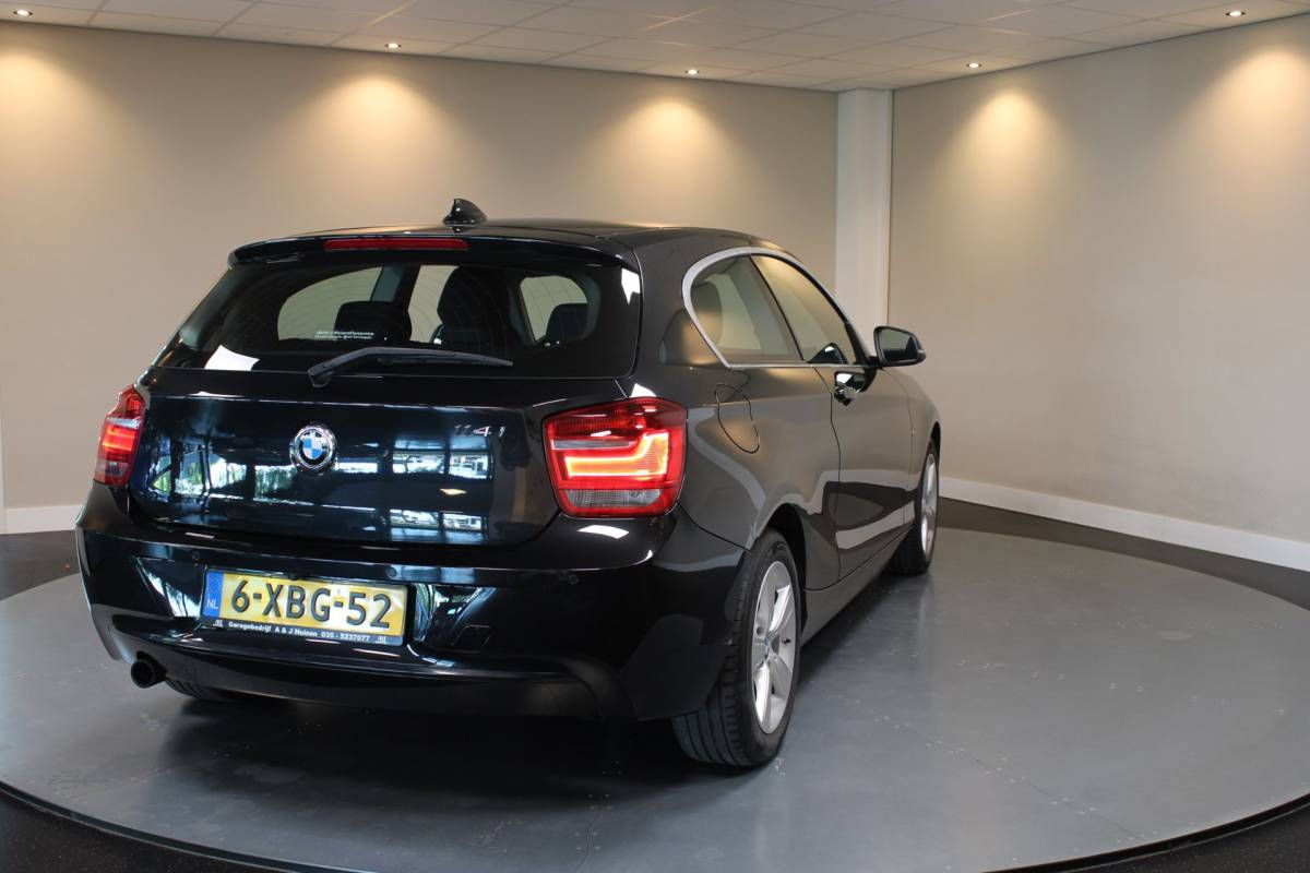 BMW 1 Serie BMW 1-serie 114i EDE Corporate Lease Edition *2de Eigenaar/Dealer OH* Camera|Cruise|Navi|PDC|NAP