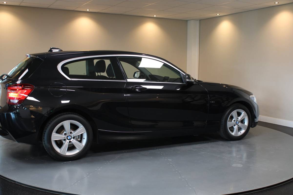BMW 1 Serie BMW 1-serie 114i EDE Corporate Lease Edition *2de Eigenaar/Dealer OH* Camera|Cruise|Navi|PDC|NAP