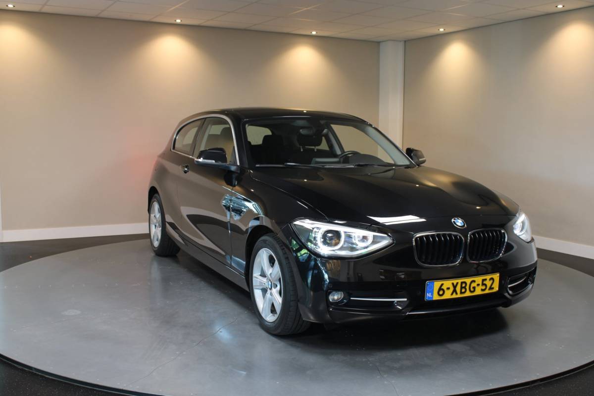 BMW 1 Serie BMW 1-serie 114i EDE Corporate Lease Edition *2de Eigenaar/Dealer OH* Camera|Cruise|Navi|PDC|NAP