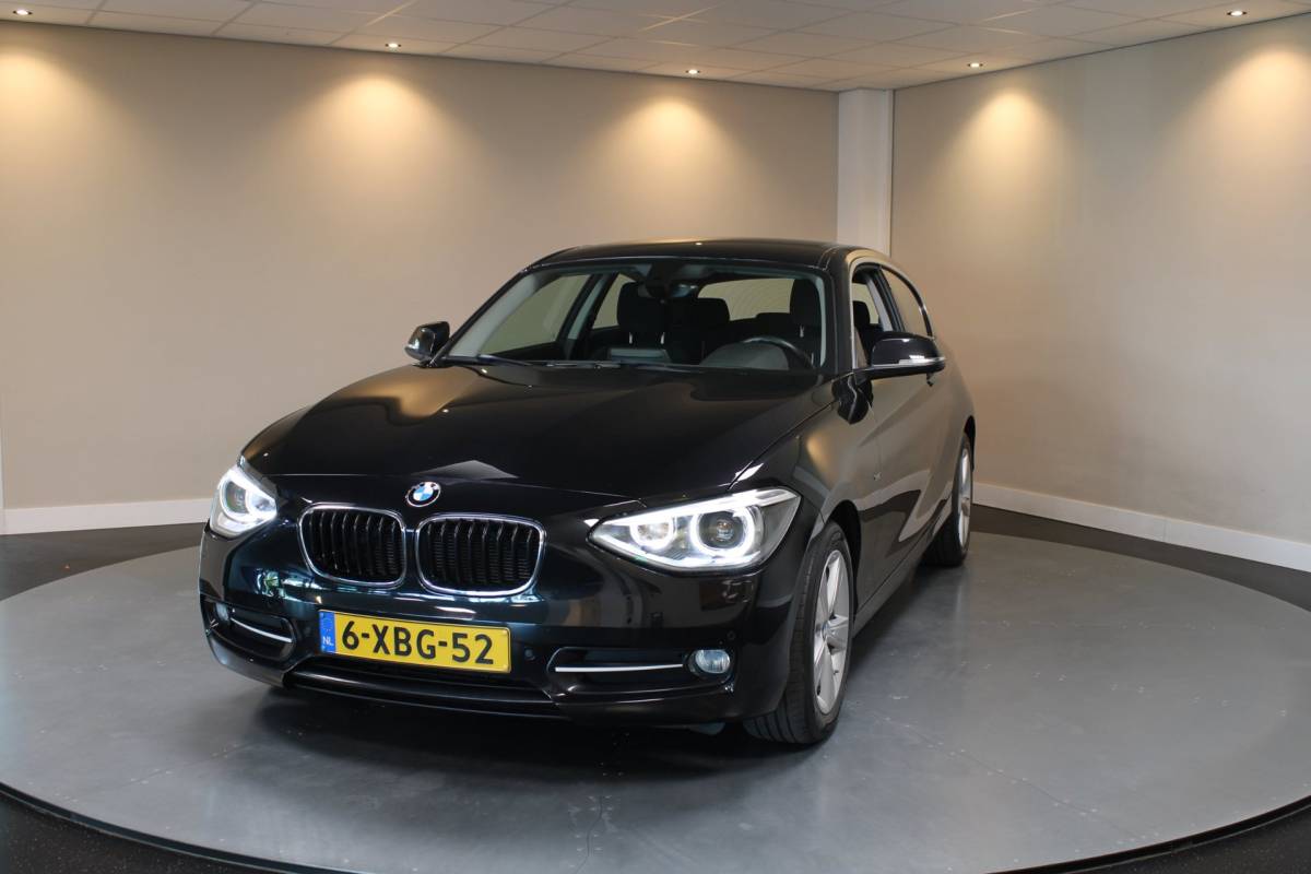 BMW 1 Serie BMW 1-serie 114i EDE Corporate Lease Edition *2de Eigenaar/Dealer OH* Camera|Cruise|Navi|PDC|NAP