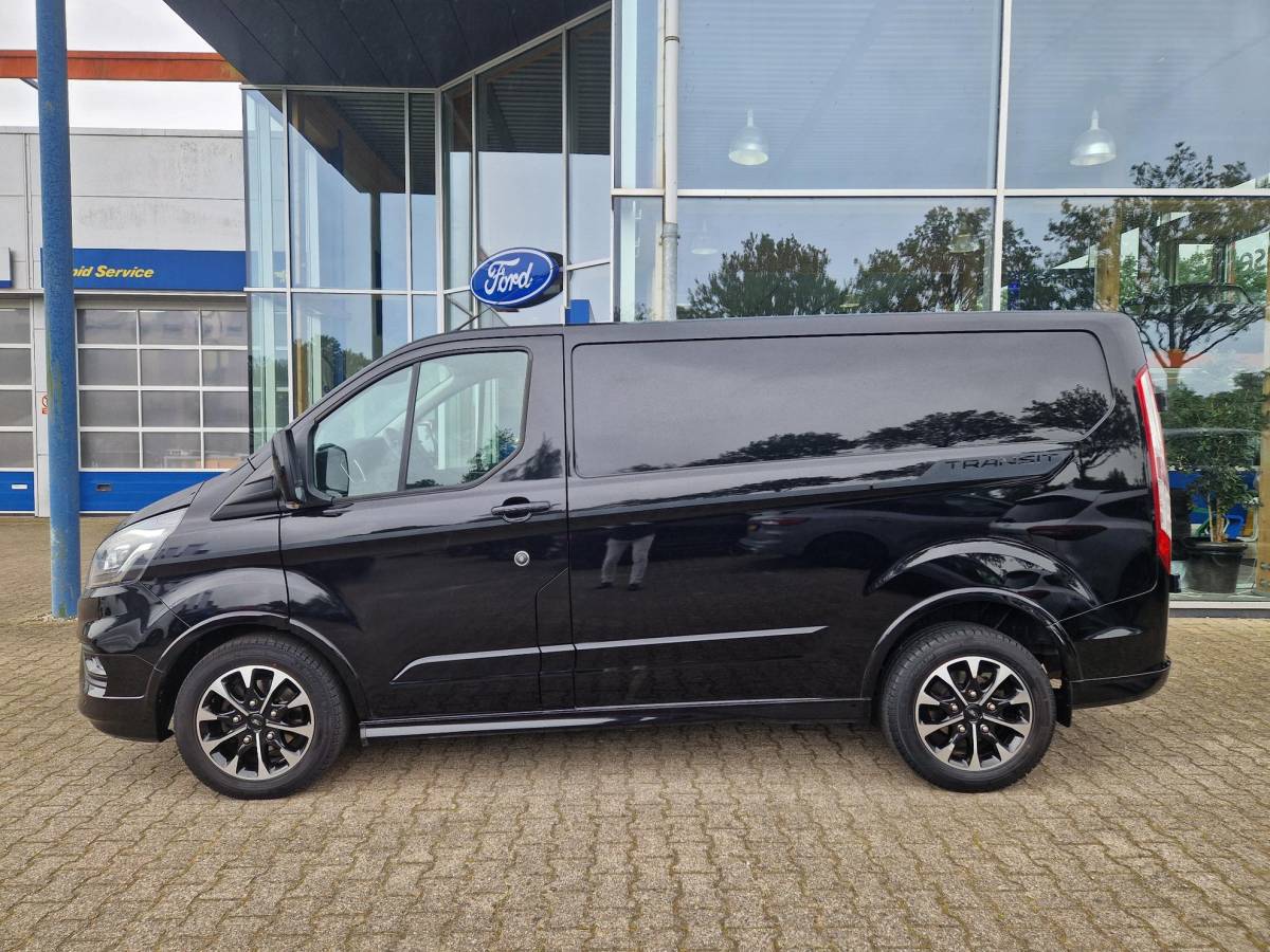 Ford Transit Custom Ford Transit Custom 320 2.0 TDCI L1H1 Sport | 185PK! | ZEER NETTE AUTO! | Bi-Xenon | Winterpack | Navigatie | Camera achter | Led dagrijverlichting | Raptor grille | Leder/stof bekleding