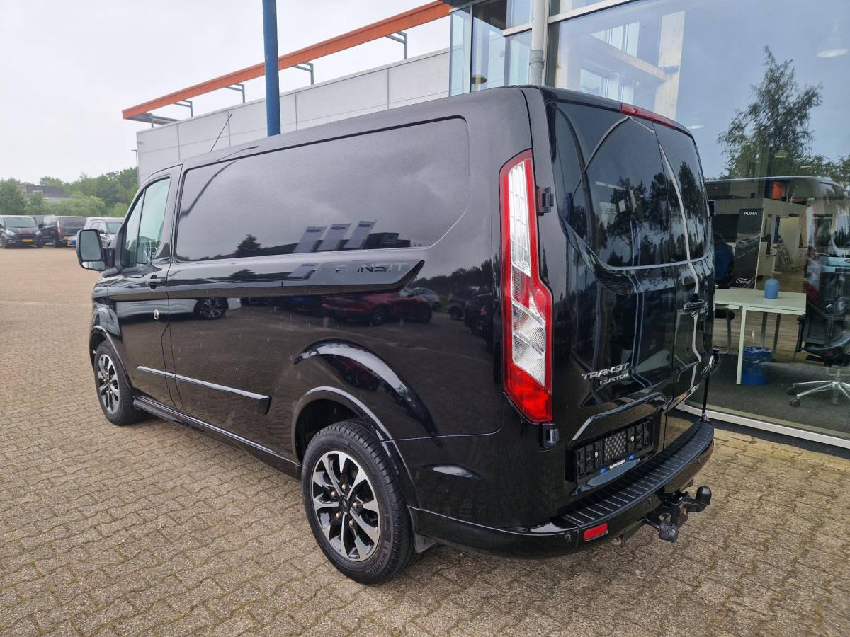 Ford Transit Custom Ford Transit Custom 320 2.0 TDCI L1H1 Sport | 185PK! | ZEER NETTE AUTO! | Bi-Xenon | Winterpack | Navigatie | Camera achter | Led dagrijverlichting | Raptor grille | Leder/stof bekleding
