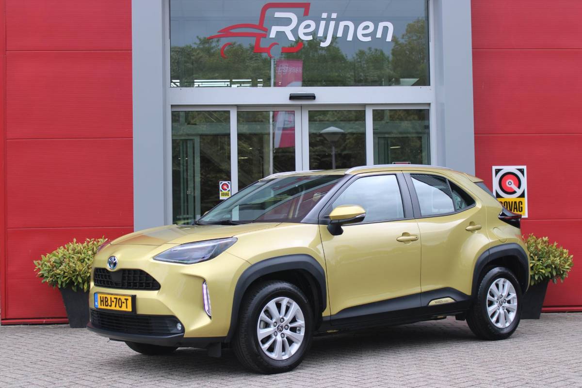 Toyota Yaris Cross Toyota Yaris Cross 1.5 Hybrid Dynamic | KEYLESS ENTRY / START | VOORSTOELEN VERWARMD | STUUR VERWARMING | HEAD-UP DISPLAY | LED KOPLAMPEN | ADAPTIVE CRUISE CONTROL | LANE ASIST |  ELEKTRISCH BEDIENBARE ACHTERKLEP | DRAADLOOS APPLE CARPLAY | ANDROID AUTO |  ACHTERUITRIJCAMERA | DRAADLOZE TELEFOONLADER | VOORRUIT VERWARMING | 16″ LICHTMETALEN VELGEN |