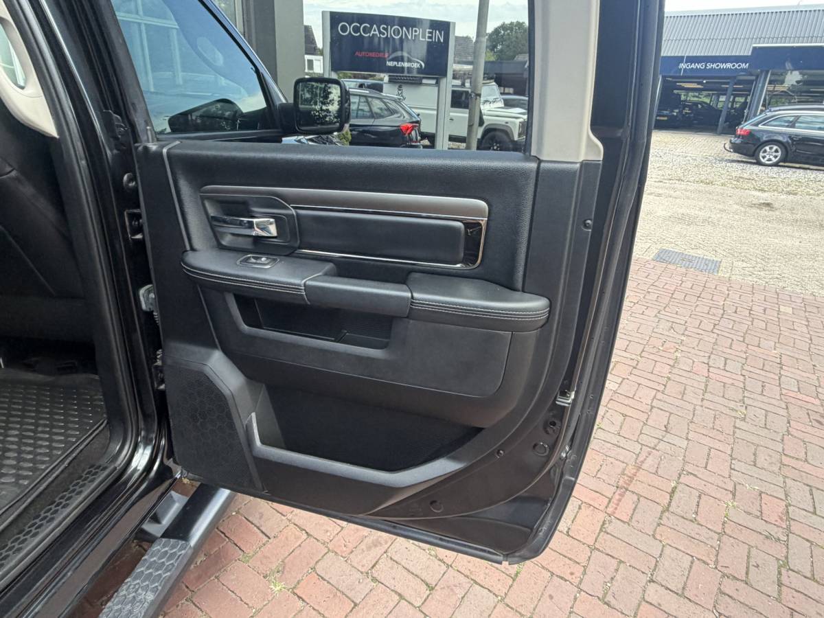 Dodge Ram 1500 Dodge Ram 1500 5.7 V8 4×4 Quad Cab 6’4 Sport 1500 5.7 HEMI V8 4×4 Quad Cab 6’4 Sport | LPG | Schuif/kanteldak | Winterpakket  06-2018 193.725 KM