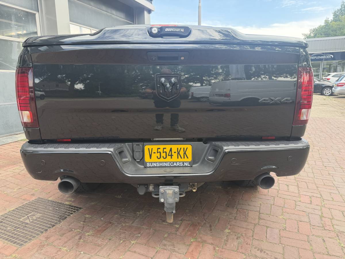 Dodge Ram 1500 Dodge Ram 1500 5.7 V8 4×4 Quad Cab 6’4 Sport 1500 5.7 HEMI V8 4×4 Quad Cab 6’4 Sport | LPG | Schuif/kanteldak | Winterpakket  06-2018 193.725 KM