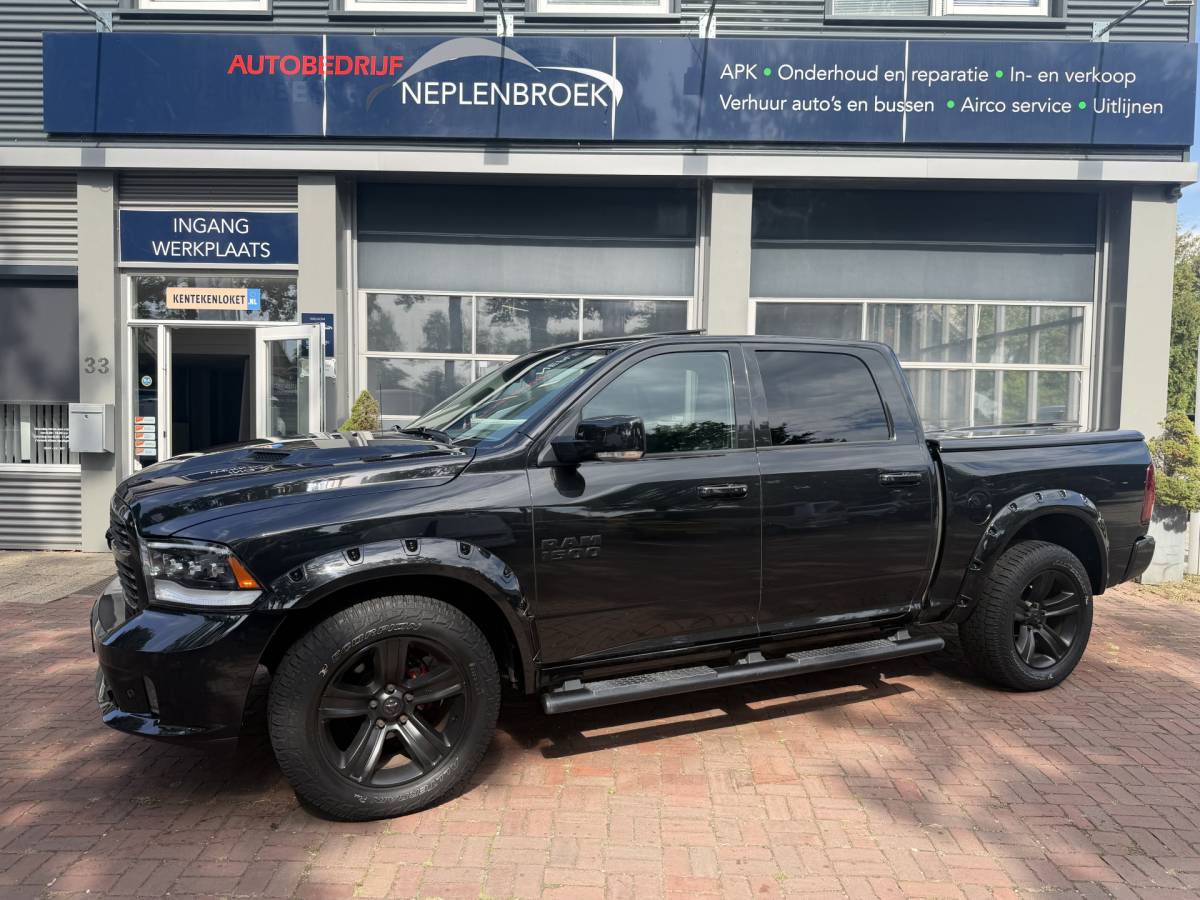 Dodge Ram 1500 Dodge Ram 1500 5.7 V8 4×4 Quad Cab 6’4 Sport 1500 5.7 HEMI V8 4×4 Quad Cab 6’4 Sport | LPG | Schuif/kanteldak | Winterpakket  06-2018 193.725 KM