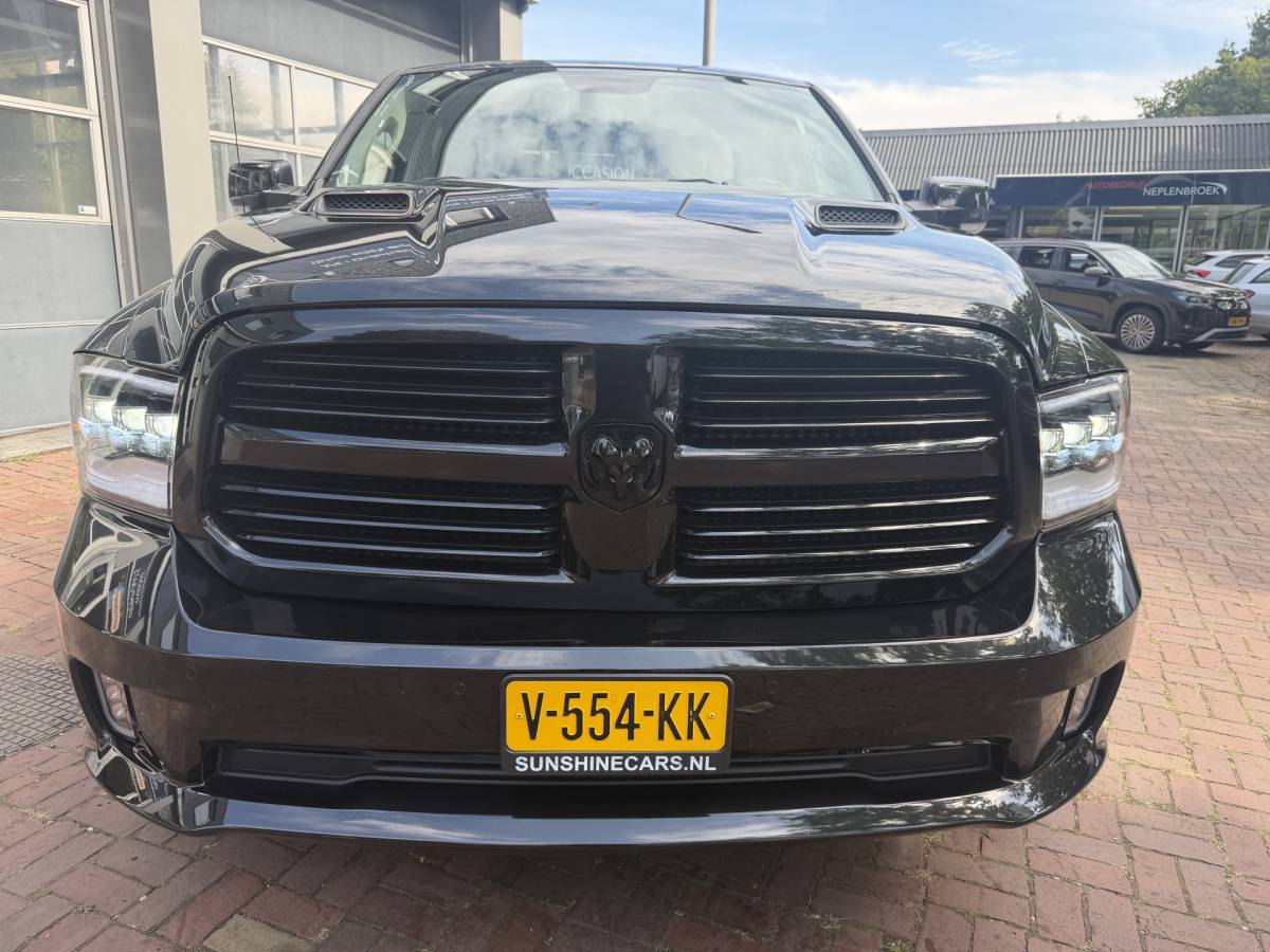 Dodge Ram 1500 Dodge Ram 1500 5.7 V8 4×4 Quad Cab 6’4 Sport 1500 5.7 HEMI V8 4×4 Quad Cab 6’4 Sport | LPG | Schuif/kanteldak | Winterpakket  06-2018 193.725 KM