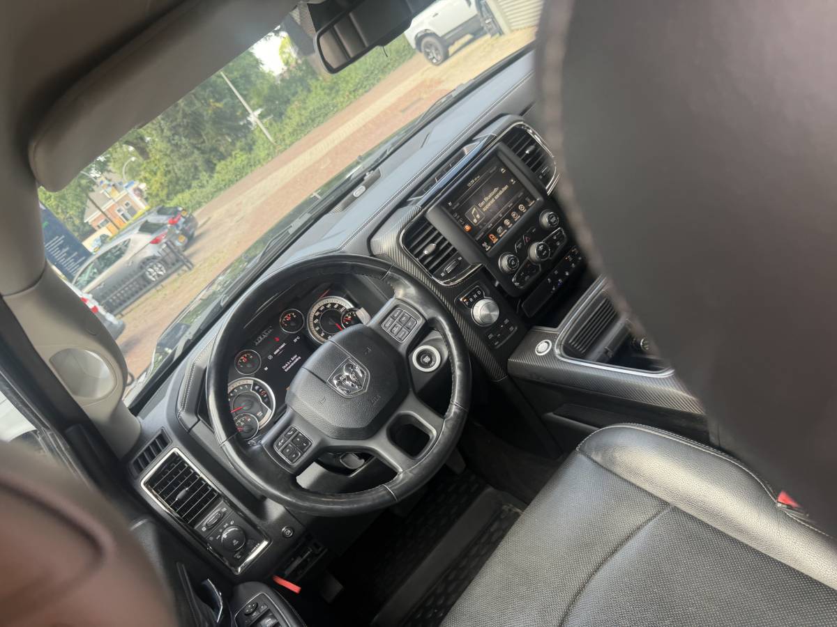 Dodge Ram 1500 Dodge Ram 1500 5.7 V8 4×4 Quad Cab 6’4 Sport 1500 5.7 HEMI V8 4×4 Quad Cab 6’4 Sport | LPG | Schuif/kanteldak | Winterpakket  06-2018 193.725 KM