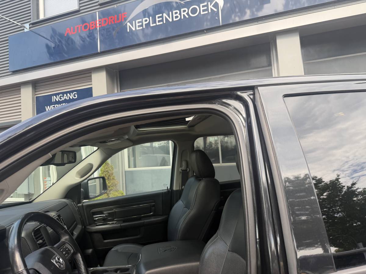 Dodge Ram 1500 Dodge Ram 1500 5.7 V8 4×4 Quad Cab 6’4 Sport 1500 5.7 HEMI V8 4×4 Quad Cab 6’4 Sport | LPG | Schuif/kanteldak | Winterpakket  06-2018 193.725 KM