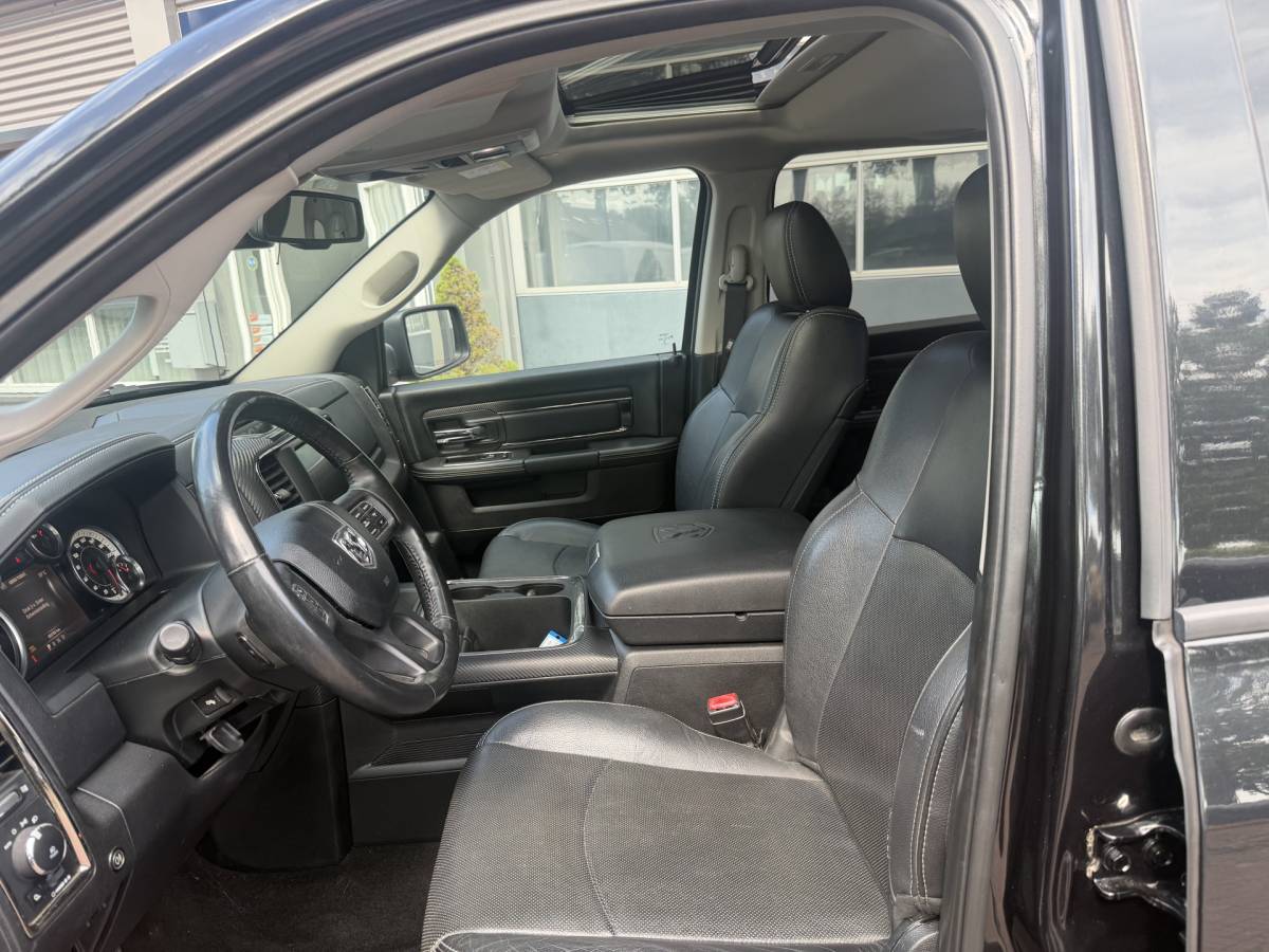 Dodge Ram 1500 Dodge Ram 1500 5.7 V8 4×4 Quad Cab 6’4 Sport 1500 5.7 HEMI V8 4×4 Quad Cab 6’4 Sport | LPG | Schuif/kanteldak | Winterpakket  06-2018 193.725 KM