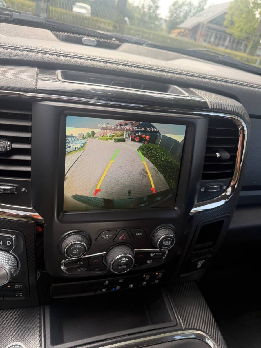 Dodge Ram 1500 Dodge Ram 1500 5.7 V8 4×4 Quad Cab 6’4 Sport 1500 5.7 HEMI V8 4×4 Quad Cab 6’4 Sport | LPG | Schuif/kanteldak | Winterpakket  06-2018 193.725 KM
