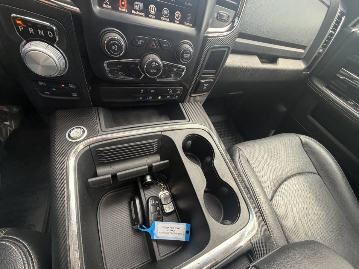 Dodge Ram 1500 Dodge Ram 1500 5.7 V8 4×4 Quad Cab 6’4 Sport 1500 5.7 HEMI V8 4×4 Quad Cab 6’4 Sport | LPG | Schuif/kanteldak | Winterpakket  06-2018 193.725 KM