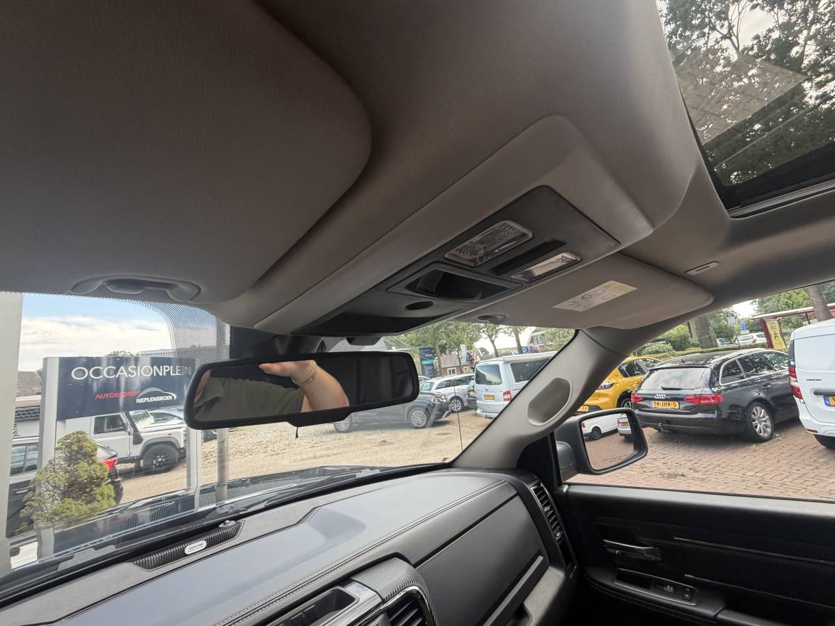 Dodge Ram 1500 Dodge Ram 1500 5.7 V8 4×4 Quad Cab 6’4 Sport 1500 5.7 HEMI V8 4×4 Quad Cab 6’4 Sport | LPG | Schuif/kanteldak | Winterpakket  06-2018 193.725 KM