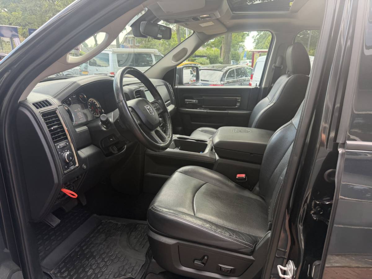 Dodge Ram 1500 Dodge Ram 1500 5.7 V8 4×4 Quad Cab 6’4 Sport 1500 5.7 HEMI V8 4×4 Quad Cab 6’4 Sport | LPG | Schuif/kanteldak | Winterpakket  06-2018 193.725 KM