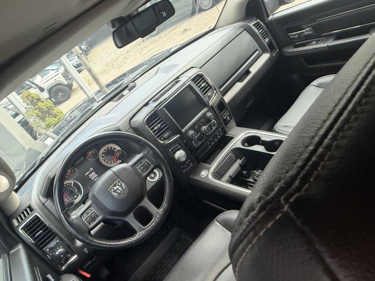 Dodge Ram 1500 Dodge Ram 1500 5.7 V8 4×4 Quad Cab 6’4 Sport 1500 5.7 HEMI V8 4×4 Quad Cab 6’4 Sport | LPG | Schuif/kanteldak | Winterpakket  06-2018 193.725 KM