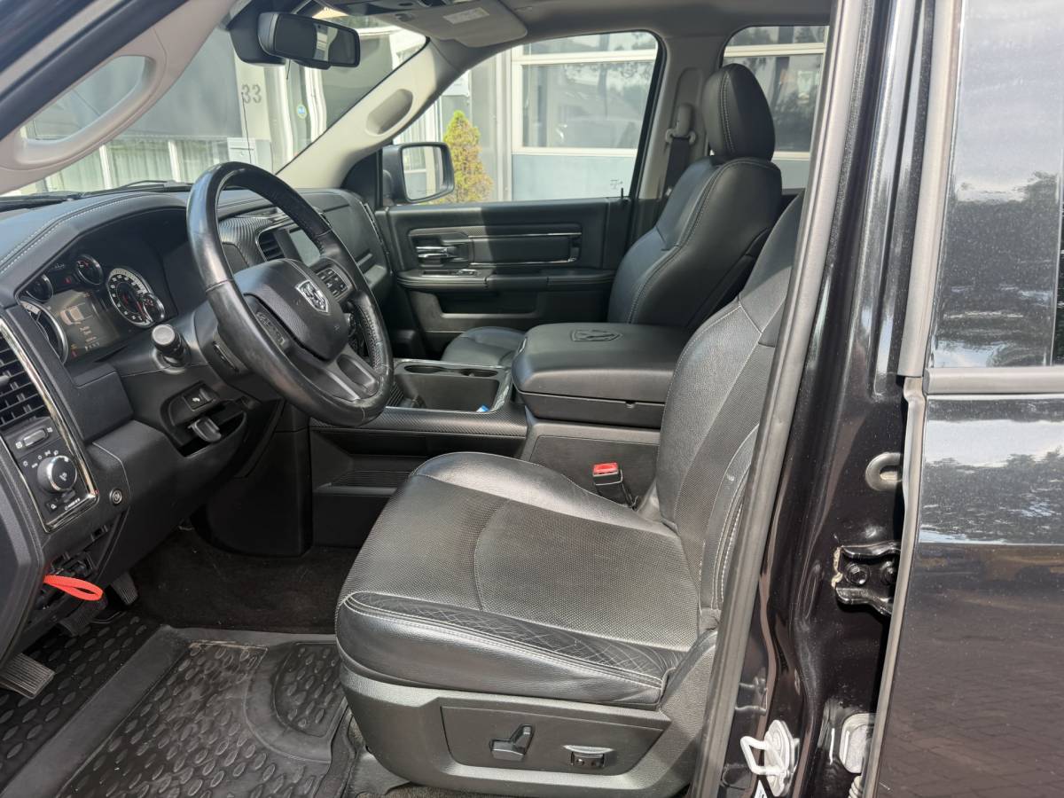 Dodge Ram 1500 Dodge Ram 1500 5.7 V8 4×4 Quad Cab 6’4 Sport 1500 5.7 HEMI V8 4×4 Quad Cab 6’4 Sport | LPG | Schuif/kanteldak | Winterpakket  06-2018 193.725 KM