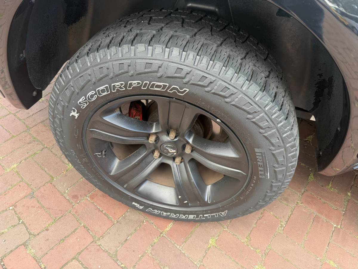 Dodge Ram 1500 Dodge Ram 1500 5.7 V8 4×4 Quad Cab 6’4 Sport 1500 5.7 HEMI V8 4×4 Quad Cab 6’4 Sport | LPG | Schuif/kanteldak | Winterpakket  06-2018 193.725 KM