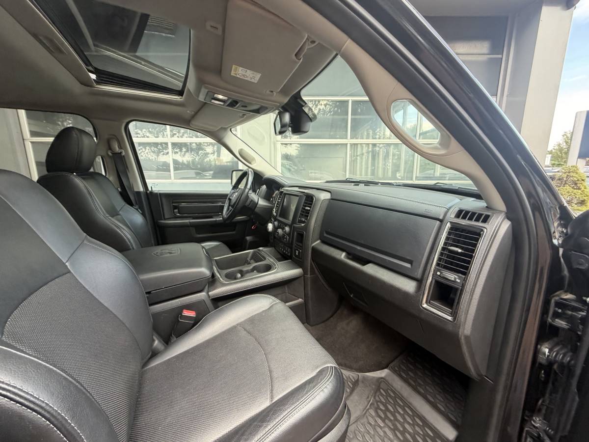 Dodge Ram 1500 Dodge Ram 1500 5.7 V8 4×4 Quad Cab 6’4 Sport 1500 5.7 HEMI V8 4×4 Quad Cab 6’4 Sport | LPG | Schuif/kanteldak | Winterpakket  06-2018 193.725 KM