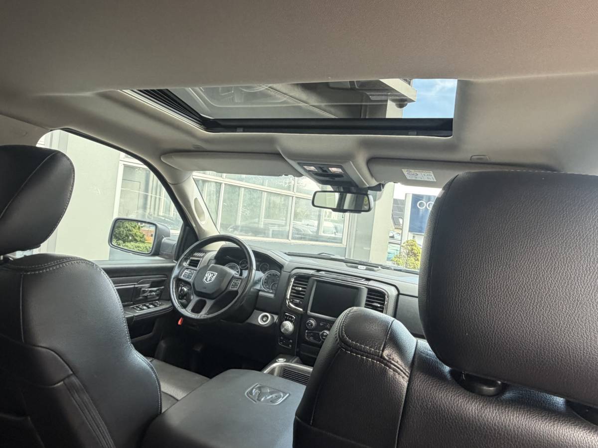 Dodge Ram 1500 Dodge Ram 1500 5.7 V8 4×4 Quad Cab 6’4 Sport 1500 5.7 HEMI V8 4×4 Quad Cab 6’4 Sport | LPG | Schuif/kanteldak | Winterpakket  06-2018 193.725 KM
