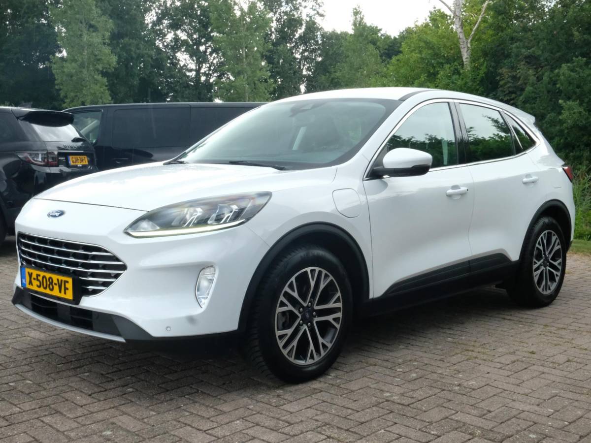 Ford Kuga Ford Kuga 2.5 PHEV Titanium 224 PK | Winterpack | Stoelverwarming | Navigatie | Parkeersensoren | CarPlay | Climate Control