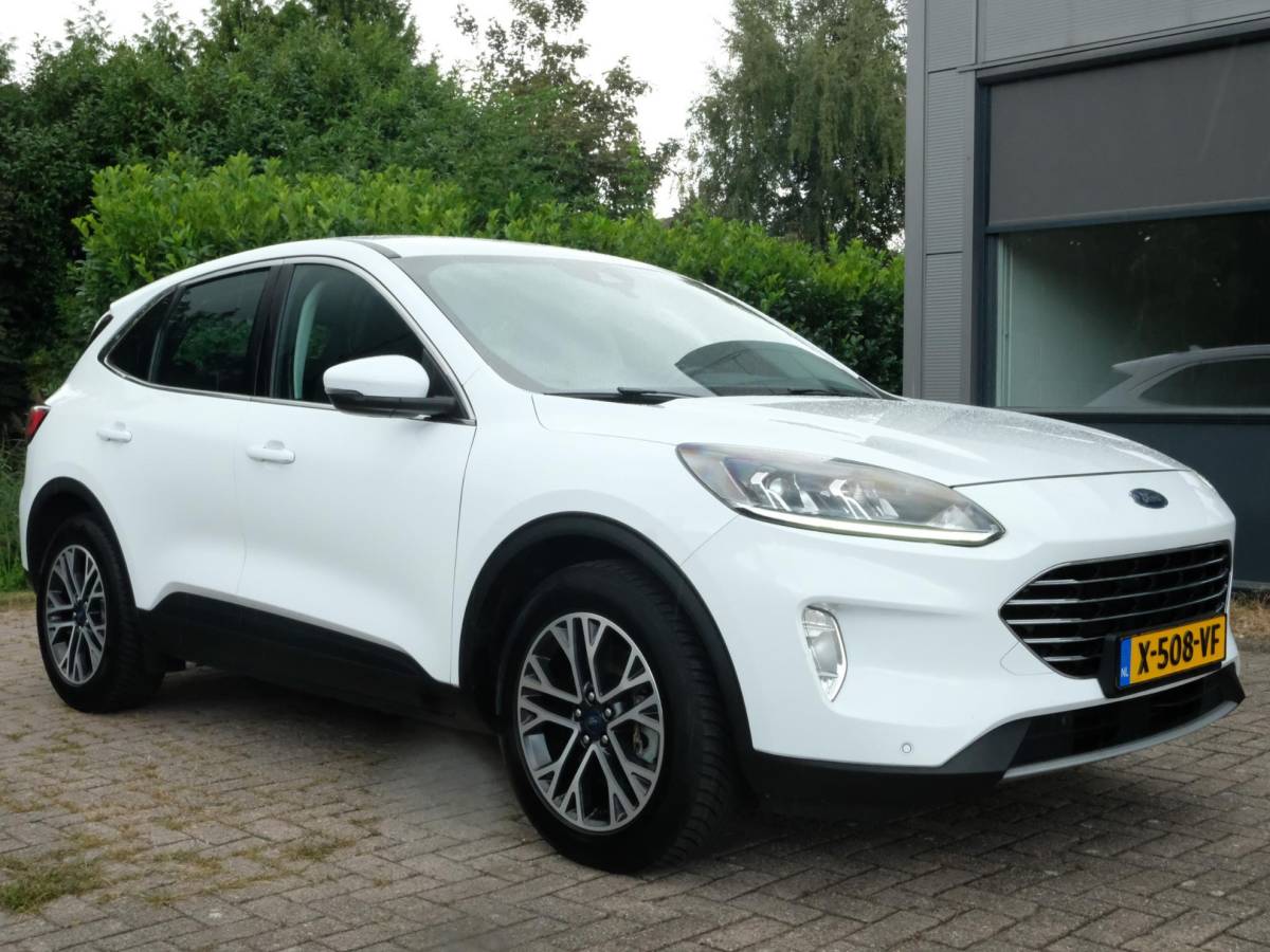 Ford Kuga Ford Kuga 2.5 PHEV Titanium 224 PK | Winterpack | Stoelverwarming | Navigatie | Parkeersensoren | CarPlay | Climate Control