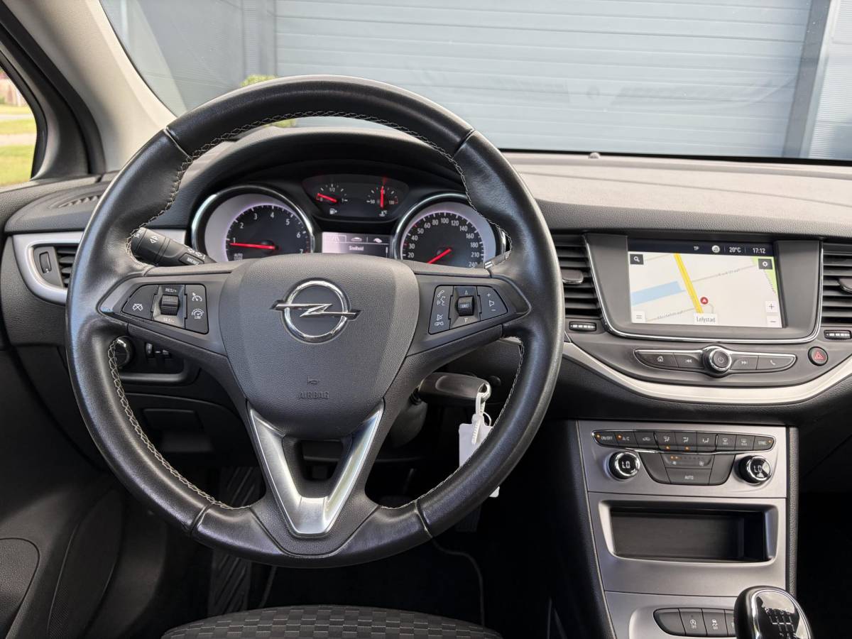 Opel Astra Opel Astra Sports Tourer 1.2 Edition ✓Camera ✓110pk✓2e Eigenaar✓Carplay✓Navi✓Airco✓Cruise✓Pdc✓LED koplampen✓N.A.P.✓6 Bak✓Pdc V+A✓Lm velgen✓Dakdragers ✓Comfortstoelen✓Bj 11-2020✓Apk tot 07-2028